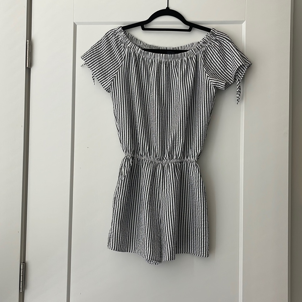 Grey and white striped, off the shoulder romper. Very cute good quality